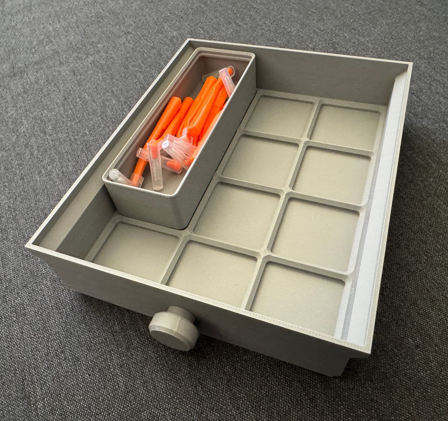 3D printed Gridfinity organiser grid and bin inside a drawer